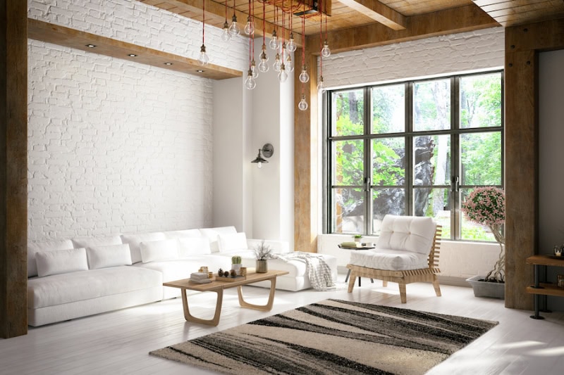 Living room decorated in white with wood accents in Arnold, Missouri, home.